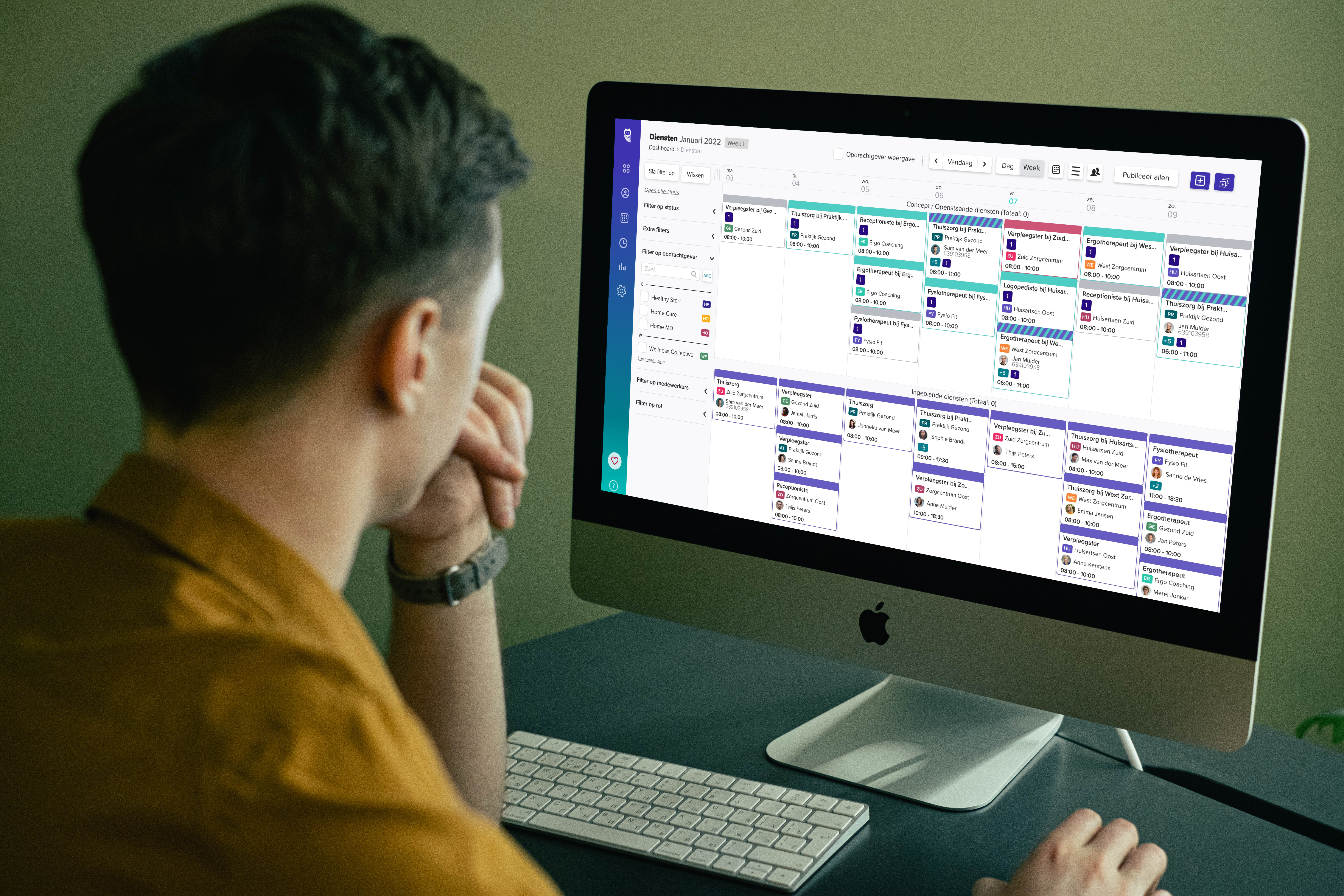 mockuuups-mockup-of-user-staring-at-his-imac-when-working